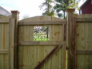 Decoarchedgatewithpostcapsand6by6s