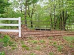 SteelFarmGateonVinyl3-RailFence2