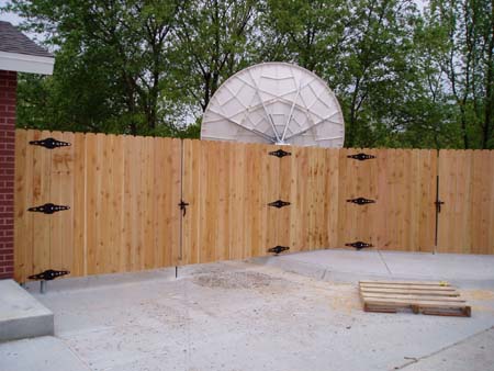 CedarBoardtoBoardOn ConcretewithSteelPosts